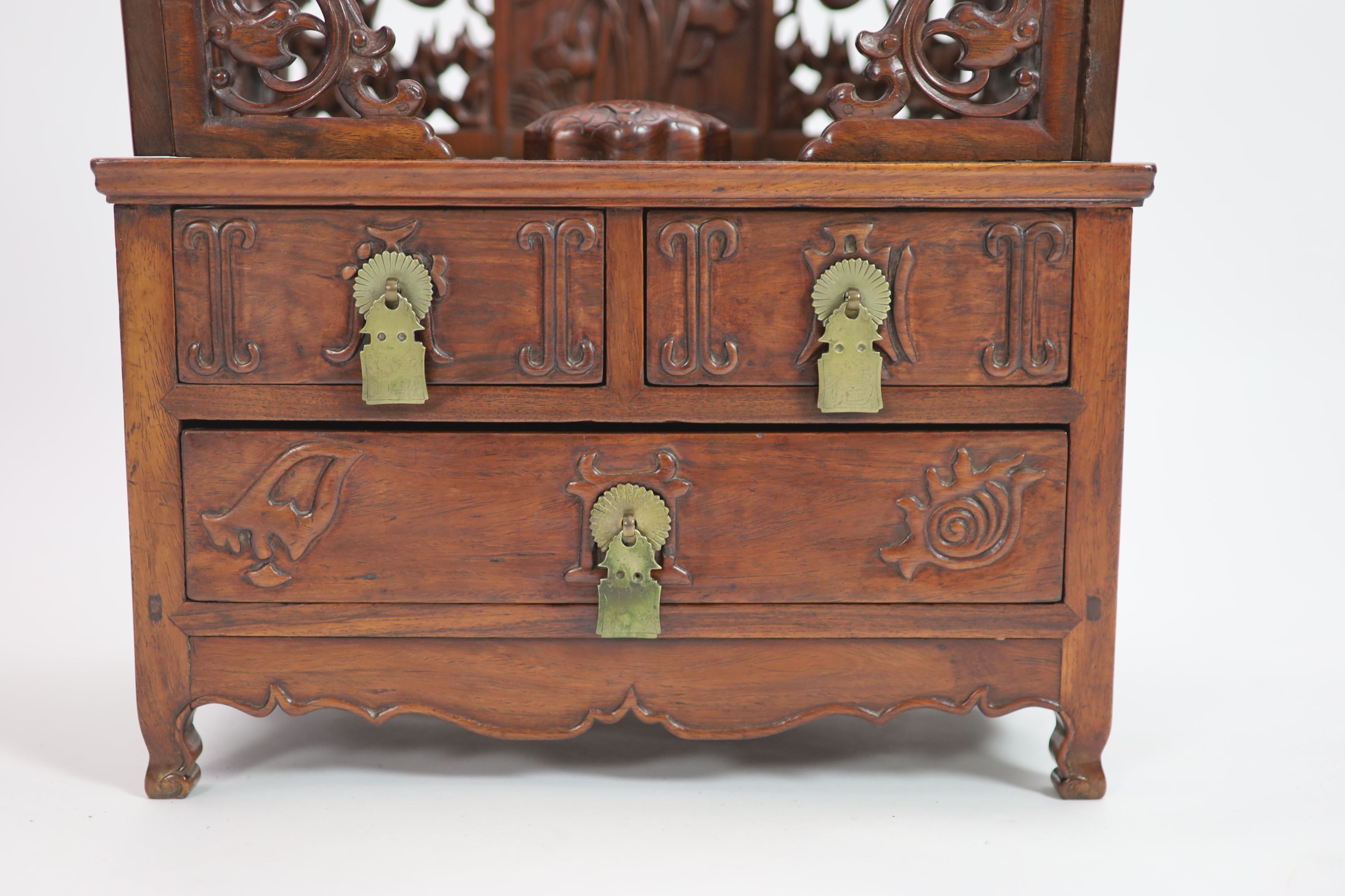 A fine Chinese huanghuali table cabinet, early Qing dynasty, 17th/18th century, 57.5 cm high, 42.5 cm wide